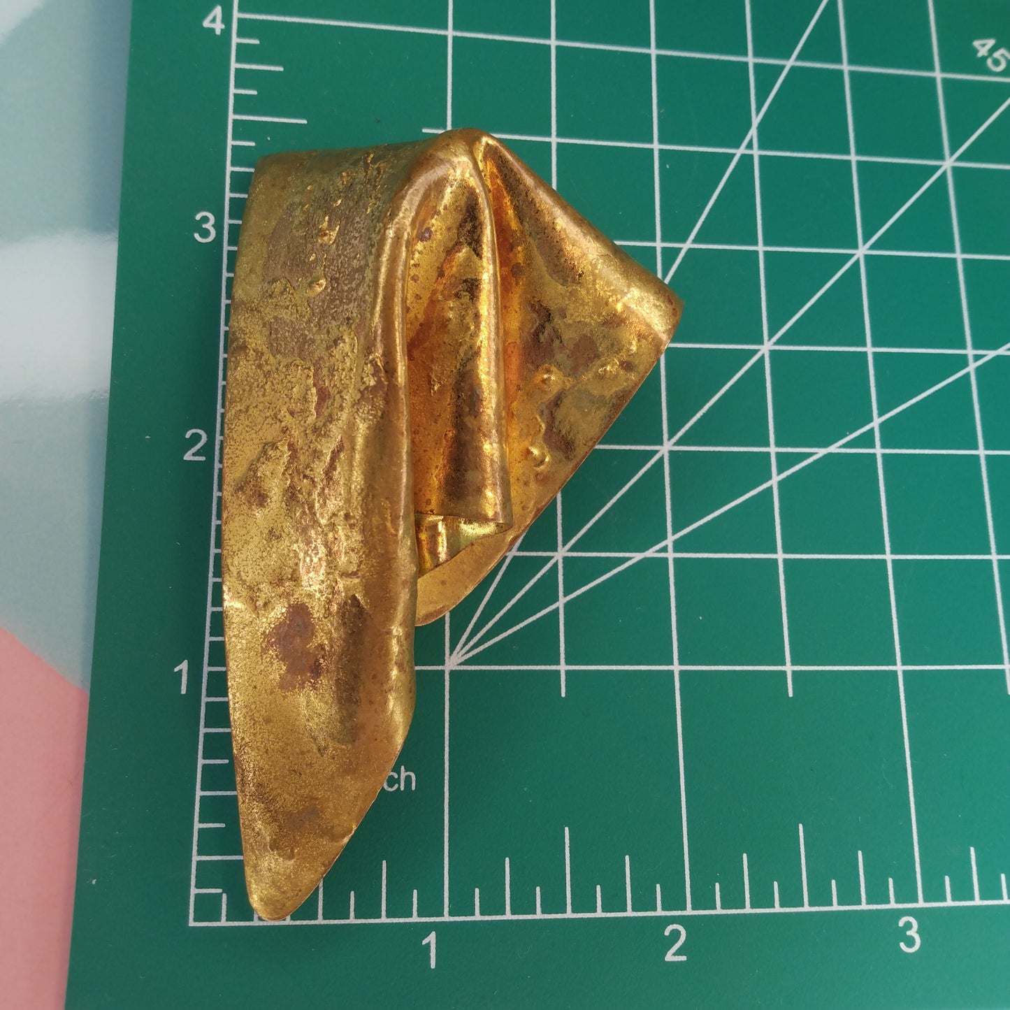 Vintage folded copper brooch with gold tone