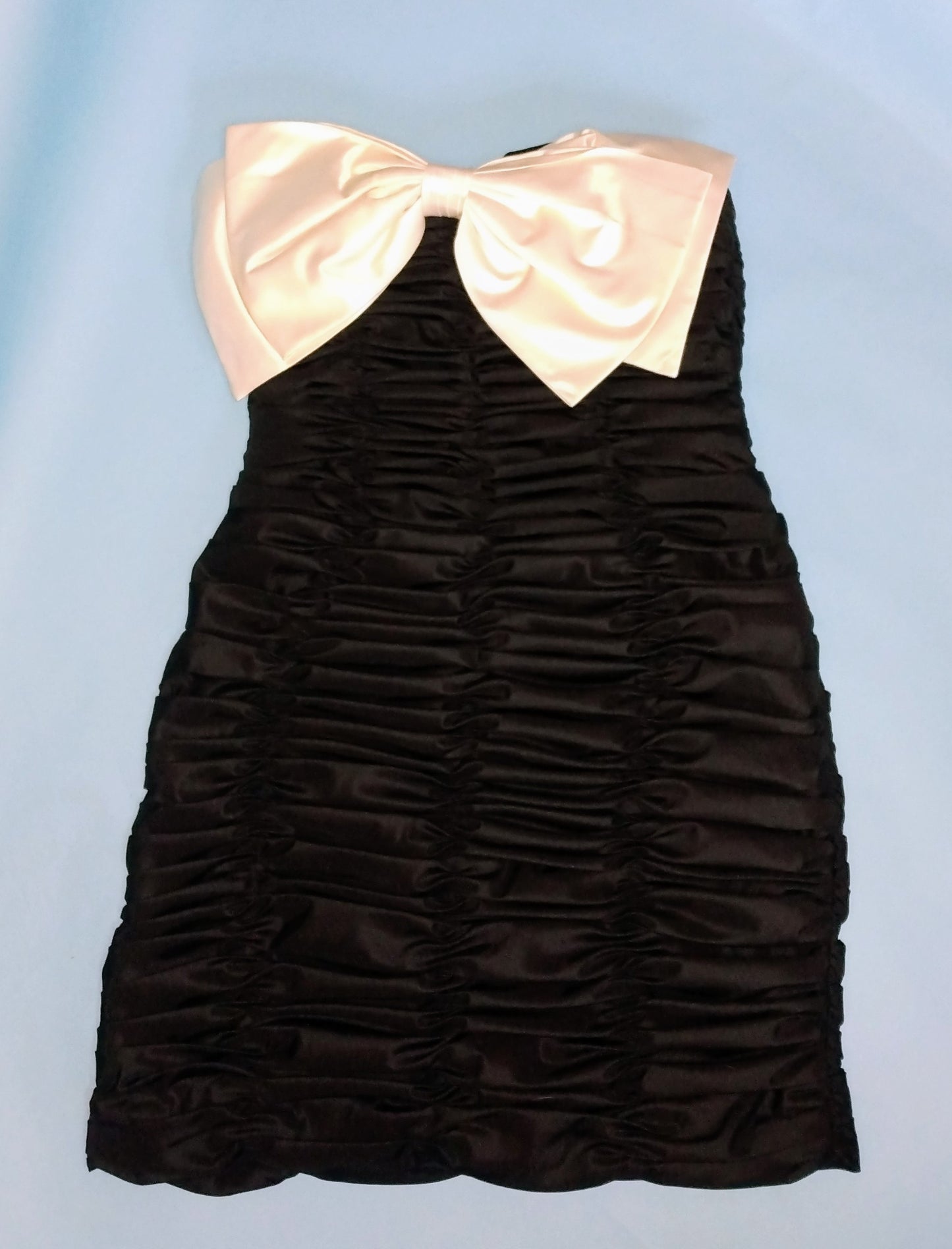 1980s ruched mini dress with large white bow by Victor Costa