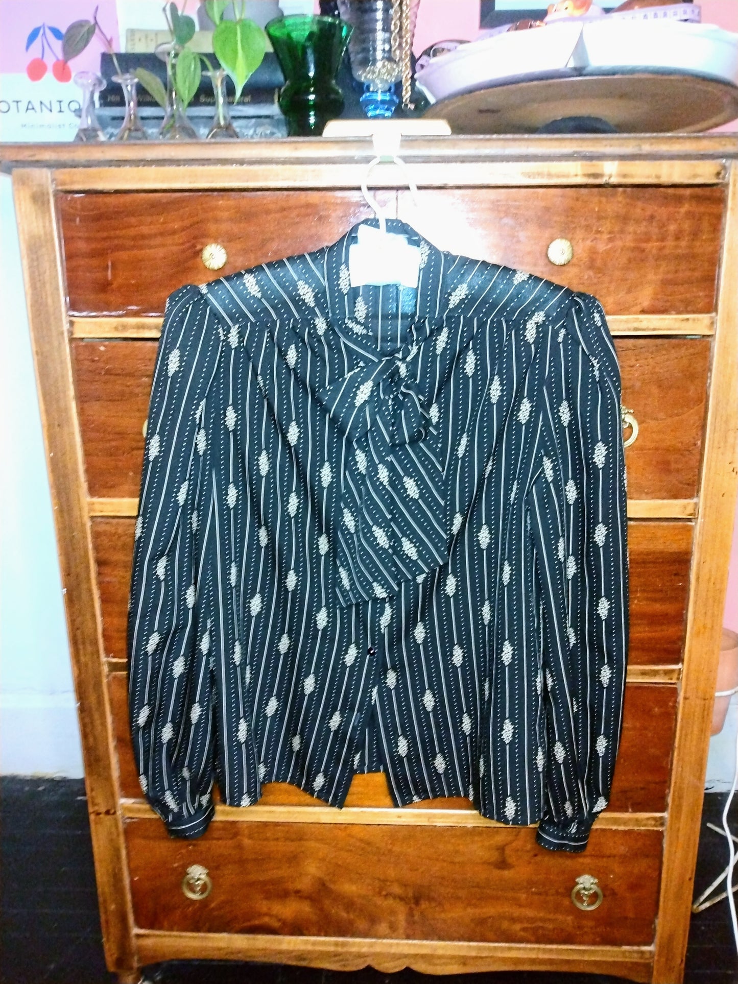 1970s black long sleeve blouse with tie neck