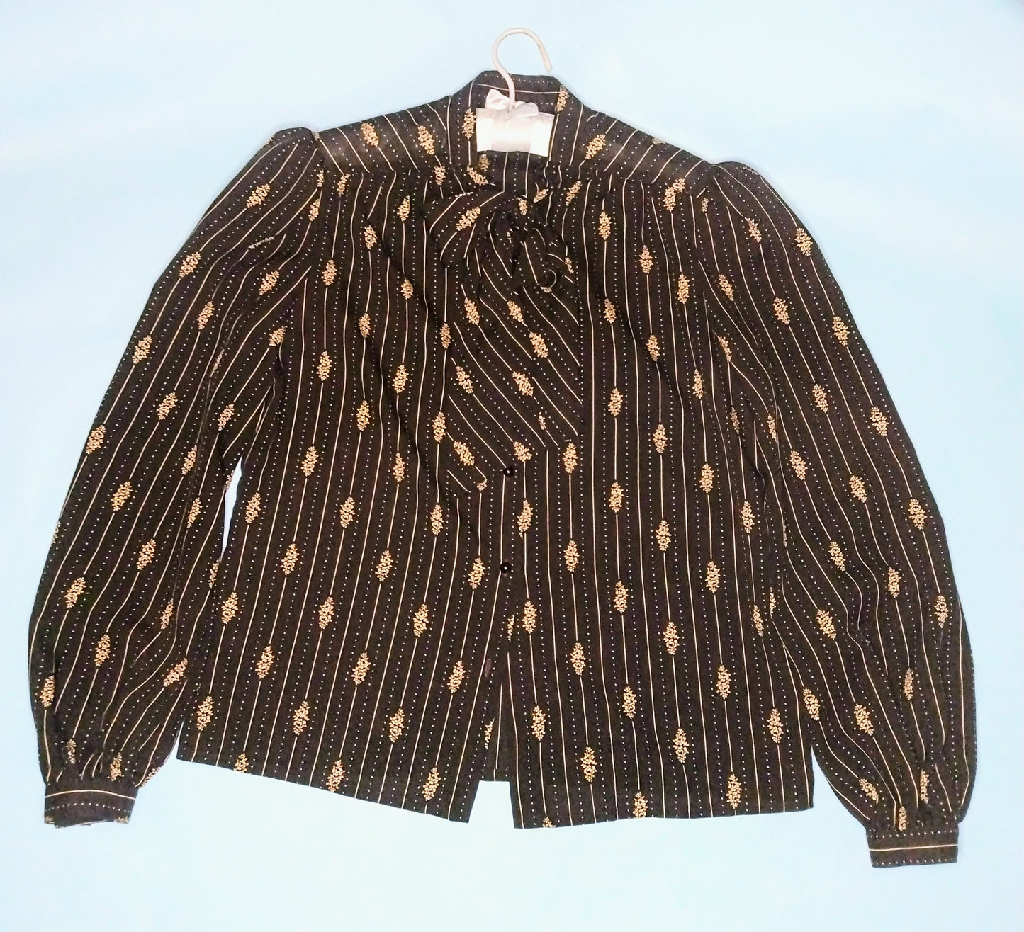 1970s black long sleeve blouse with tie neck