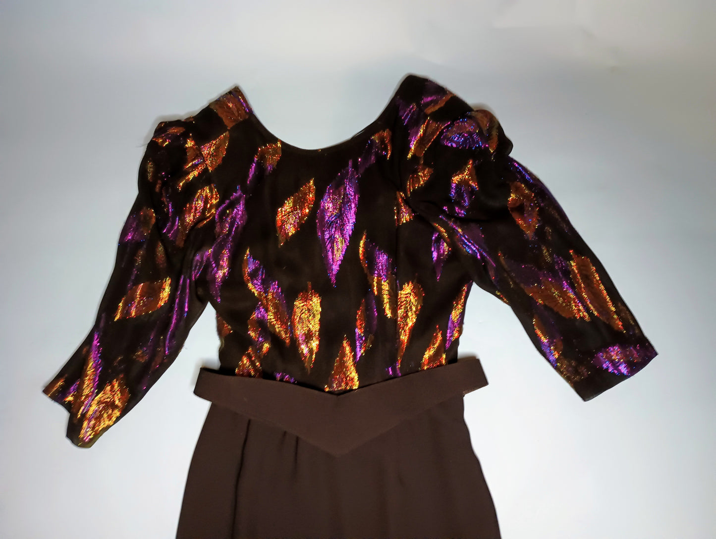 Vintage 1980s cocktail dress with purple and gold iridescent feathers