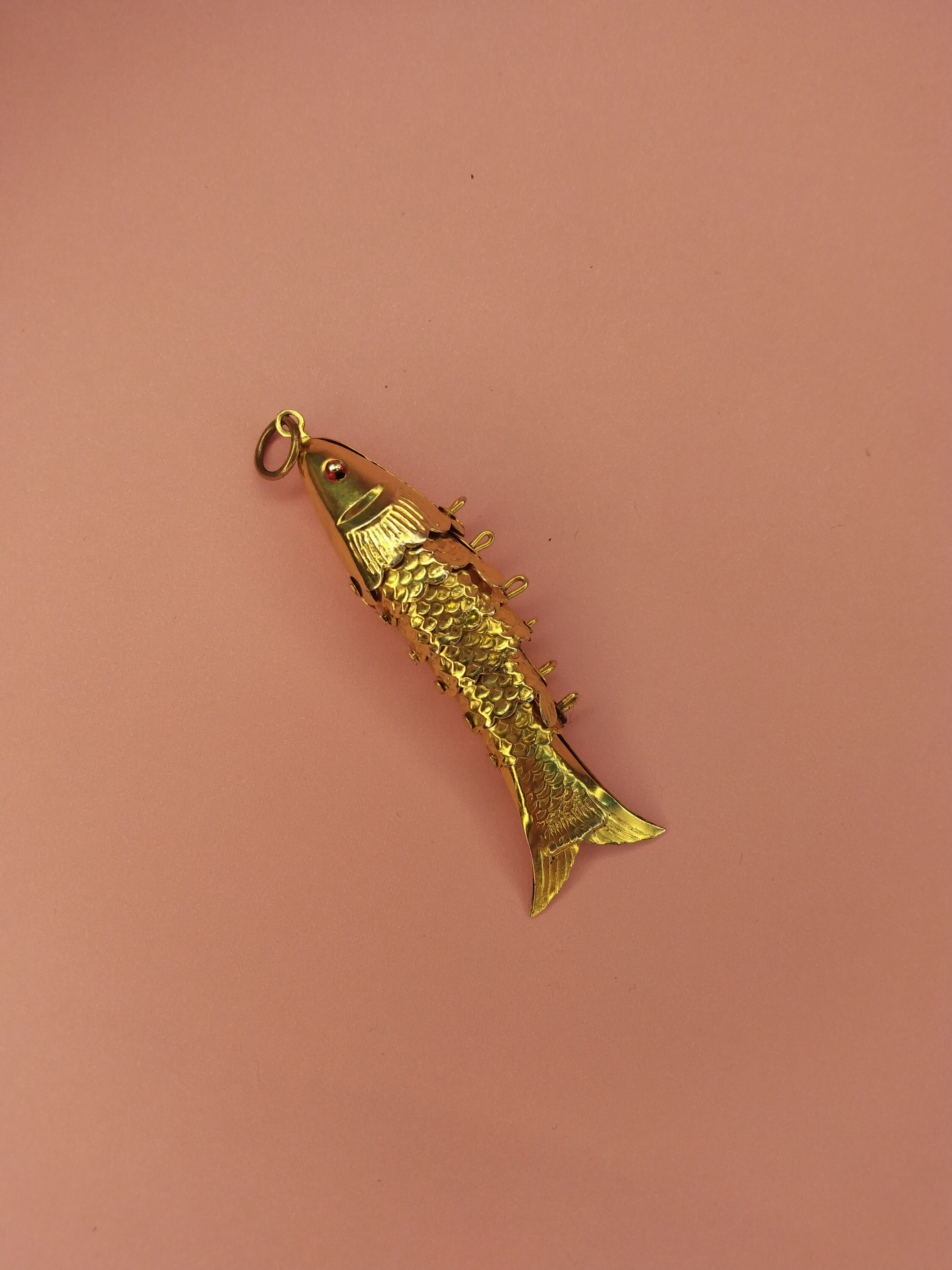 Gold articulated clearance fish pendant