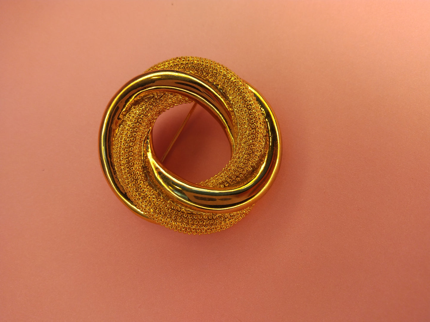 Vintage Monet gold tone double circle brooch