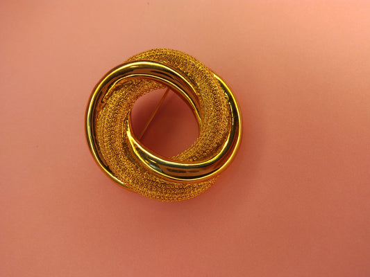 Vintage Monet gold tone double circle brooch