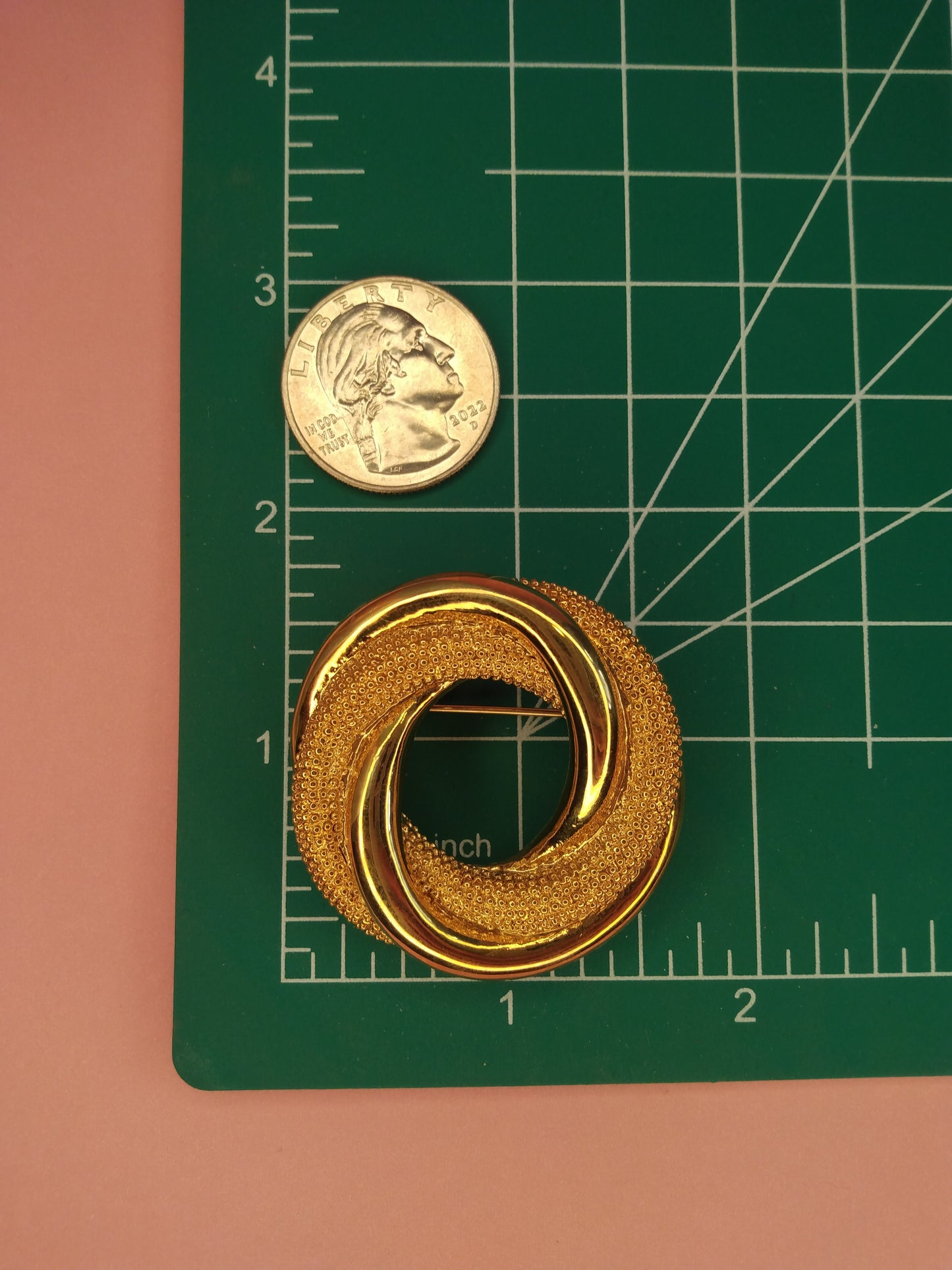 Vintage Monet gold tone double circle brooch