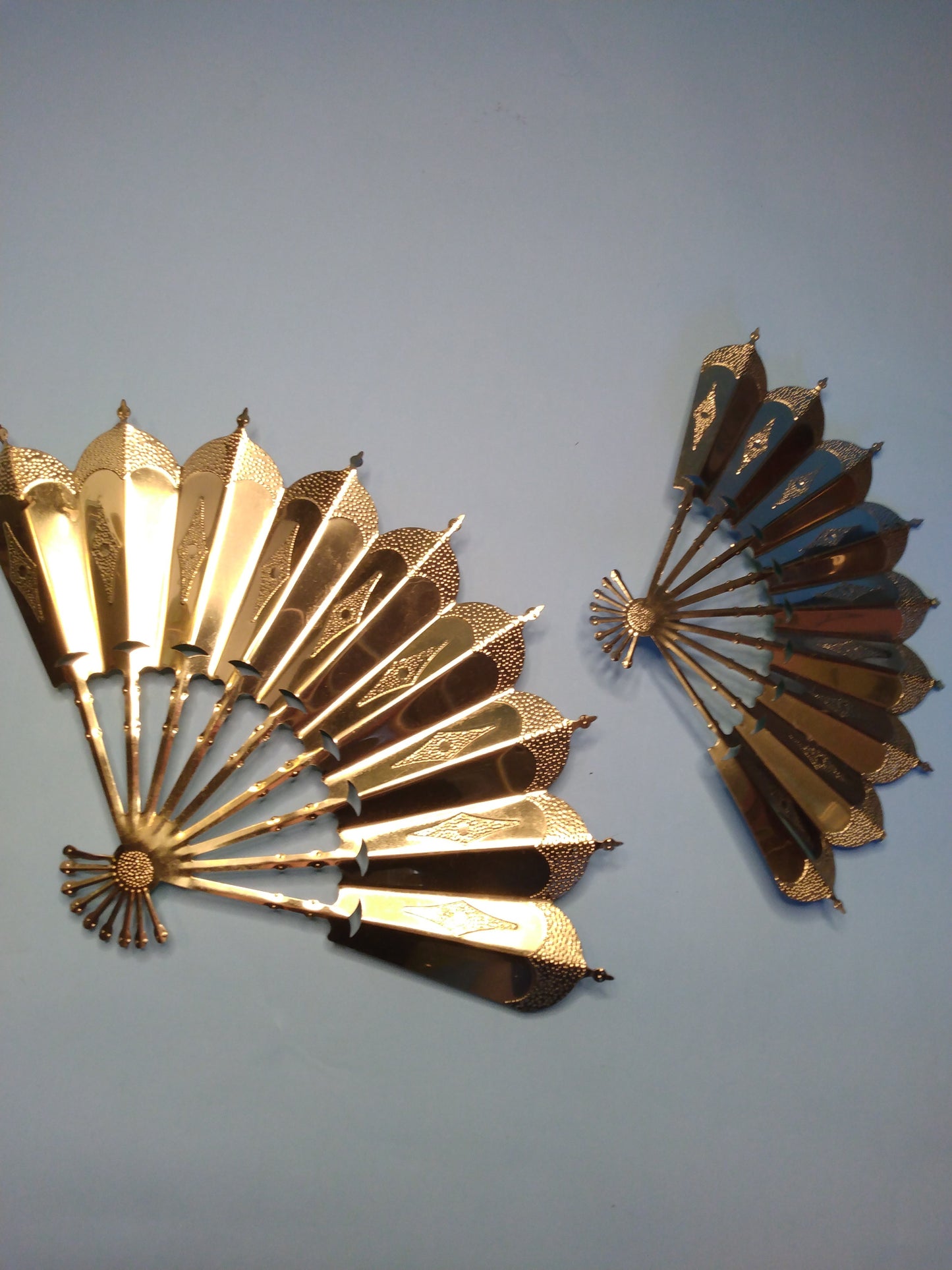 Vintage pair of gold tone fan wall decor