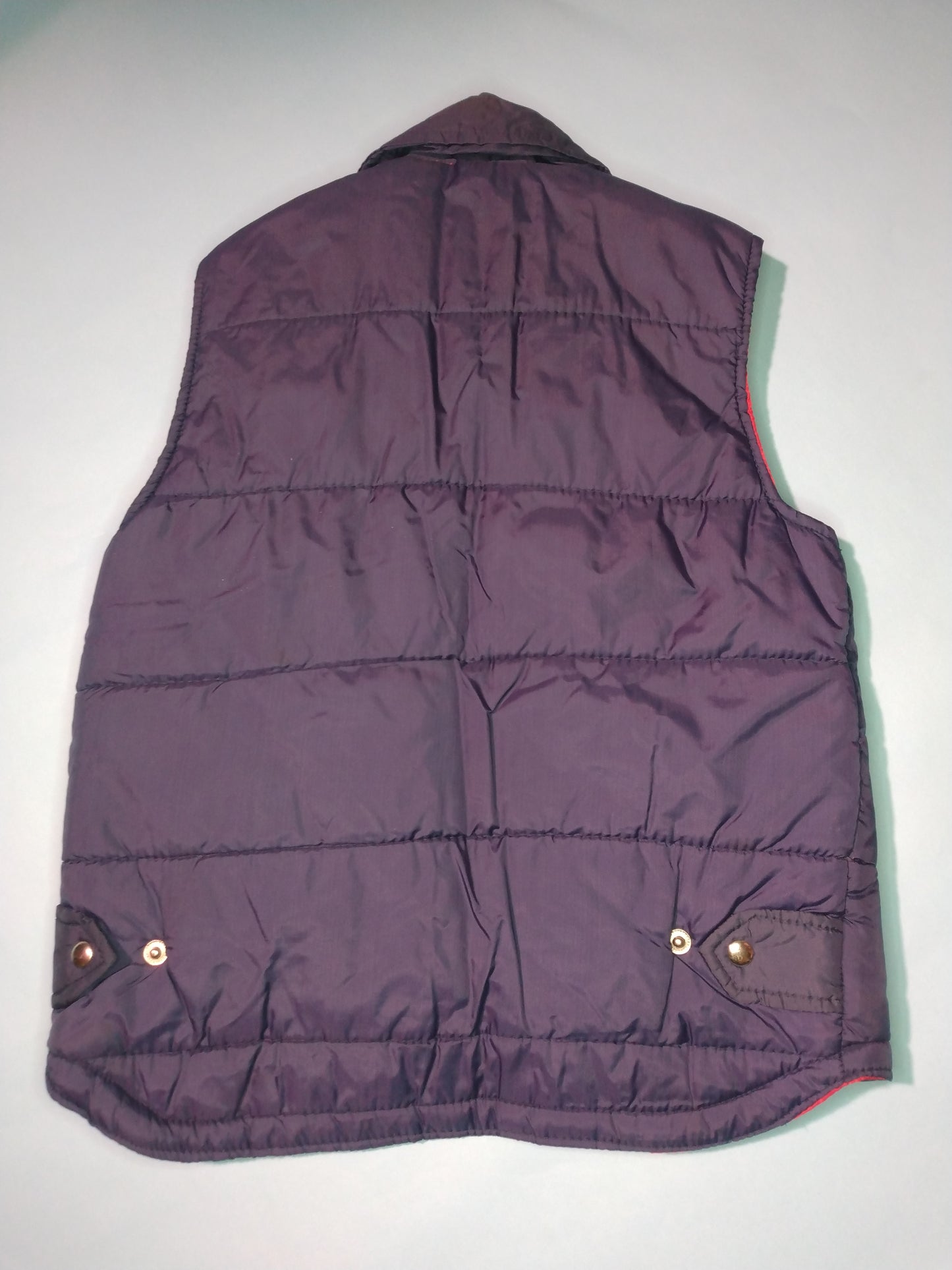 1970s navy puffer vest with red lining