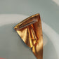 Vintage folded copper brooch with gold tone