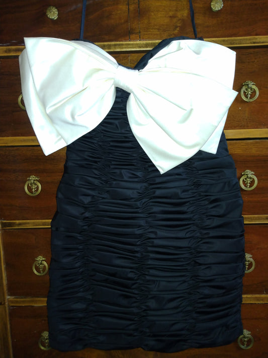 1980s ruched mini dress with large white bow by Victor Costa